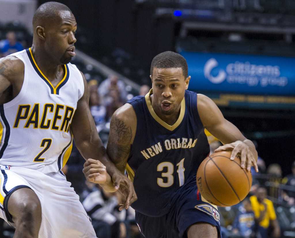 FILE - In this Oct. 3, 2015, file photo, New Orleans Pelicans' Bryce Dejean-Jones (31) drives the ball around the defense of Indiana Pacers' Rodney Stuckey (2) during the first half of a preseason NBA basketball game in Indianapolis. Police say Saturday, May 28, 2016,  Dejean-Jones was fatally shot after breaking down the door to a Dallas apartment. Sr. Cpl. DeMarquis Black said in a statement that officers were called early Saturday morning and found the 23-year-old player collapsed in an outdoor passageway. He was taken to a hospital where he died.  (AP Photo/Doug McSchooler, File)