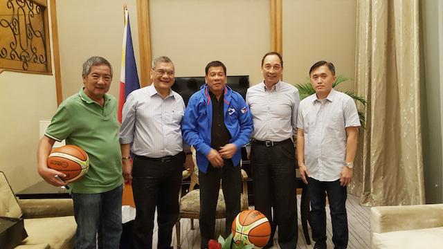 Presumptive President Rodrigo Duterte, middle, wears a Gilas Pilipinas jacket during a meeting with the Samahang Basketbol ng Pilipinas in Davao. CONTRIBUTED PHOTO