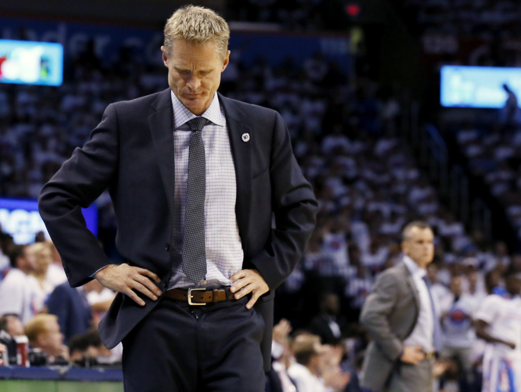 Golden State Warriors head coach Steve Kerr walks the sideline during the first half against the Oklahoma City Thunder in Game 4 of the NBA basketball Western Conference finals in Oklahoma City, Tuesday, May 24,, 2016. (AP Photo/Sue Ogrocki)