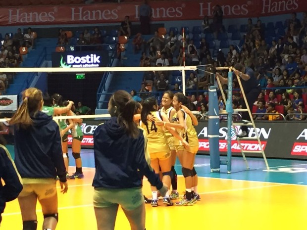 NU Lady Bulldogs celebrate their opening win the Shakey's V-League. 