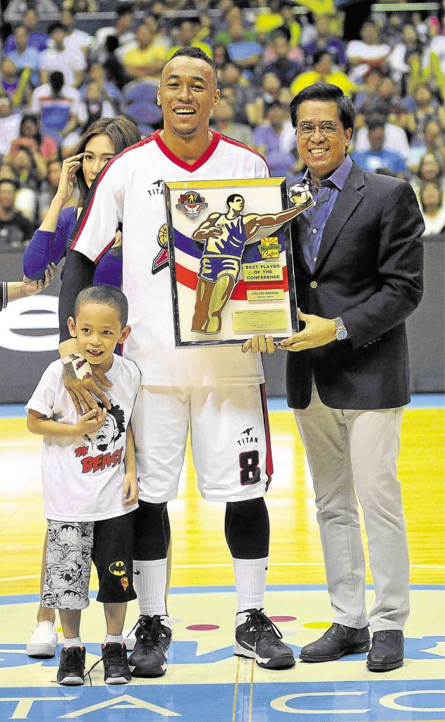 CALVIN Abueva, with son Calvin James, receives his Best Player of the Conference award from PBA commissioner Chito Narvasa. AUGUST DELA CRUZ
