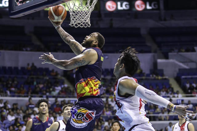 Rain or Shine import Pierre Henderson-Niles goes for a reverse against San Miguel Beer center June Mar Fajardo in Game 4 of their semifinals series on Sunday, May 1, 2016, at Smart Araneta Coliseum. Tristan Tamayo/INQUIRER.net