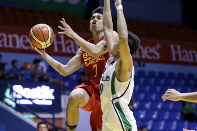 San Sebastian's Michael Calisaan (7) goes for a layup against College of St. Benilde during the NCAA Season 91 at San Juan Arena. Tristan Tamayo/INQUIRER.net