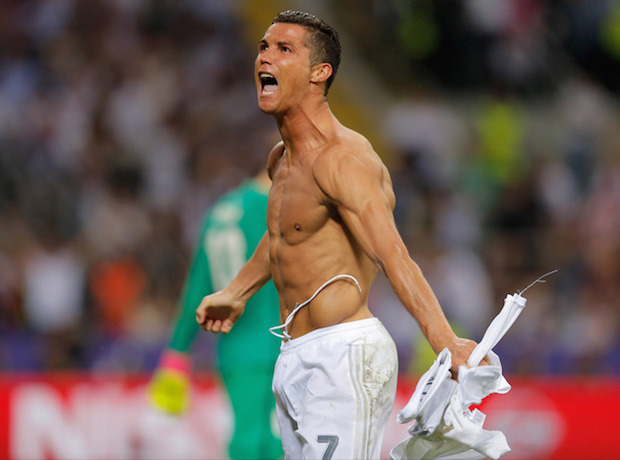Real Madrid's Cristiano Ronaldo celebrates after scoring the winning penalty shootout during the Champions League final soccer match between Real Madrid and Atletico Madrid at the San Siro stadium in Milan, Italy, Saturday, May 28, 2016. Real Madrid won 5-4 on penalties after the match ended 1-1 after extra time.  AP
