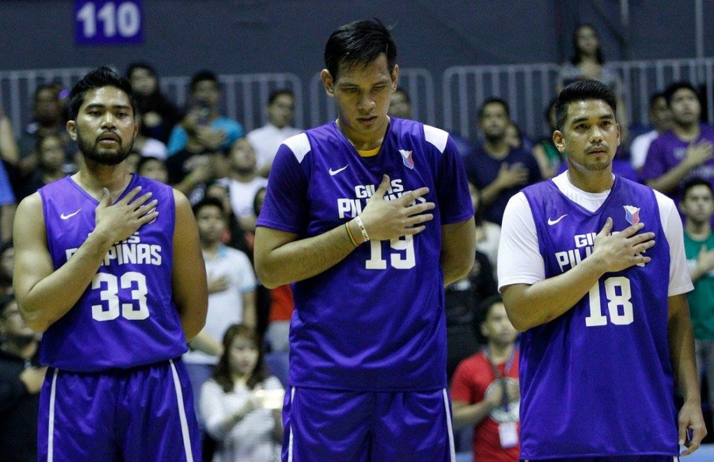 (From L-R) Ranidel de Ocampo, June Mar Fajardo and Ryan Reyes signing the national anthem. PBA IMAGES