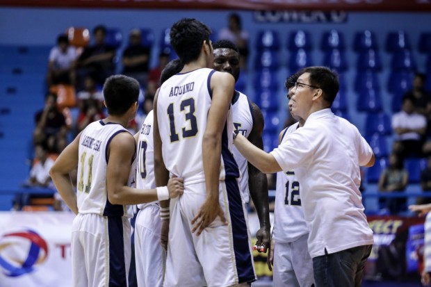 Nu Bulldogs and coach Eric Altamirano. Photo by Tristan Tamayo/INQUIRER.net