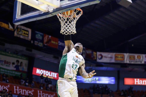 La Salle's Ben Mbala dunks the ball against Arellano University in the 2016 Filoil Flying V Preseason Premier Cup Finals Sunday, June 12, 2016, at Filoil Flying V Centre in San Juan. Mbala had 28 points, 26 rebounds and eight blocks to lead the Green Archers over the Chiefs, 86-74, and a fourth title in the preseason tournament. Tristan Tamayo/INQUIRER.net