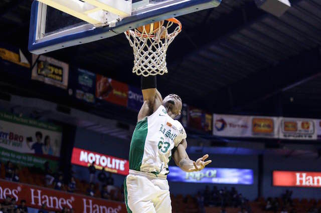 La Salle's Ben Mbala dunks the ball against Arellano University in the 2016 Filoil Flying V Preseason Premier Cup Finals Sunday, June 12, 2016, at Filoil Flying V Centre in San Juan. Mbala had 28 points, 26 rebounds and eight blocks to lead the Green Archers over the Chiefs, 86-74, and a fourth title in the preseason tournament. Tristan Tamayo/INQUIRER.net