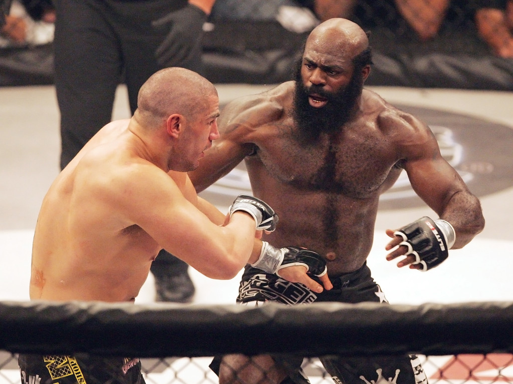 File-This May 31, 2008, file photo shows Kimbo Slice, right, battling James Thompson of Manchester, England during their EliteXC heavyweight bout at the Prudential Center in Newark, N.J.  Police in Florida say Slice has been taken to a hospital, though reason why wasn't immediately clear. Coral Springs Police Sgt. Carla Kmiotek said Monday, June 6, 2016,  that a local hospital told the department the fighter, whose real name is Kevin Ferguson, was a patient. (AP Photo/Rich Schultz, File)