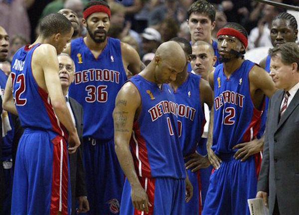 FILE - In this June 23, 2005, file photo, Detroit's Pistons' Chauncey Billups (1) and his teammates show their dejection during the closing seconds of Game 7 of the NBA Finals against the against the San Antonio Spurs in San Antonio. Former Pistons guard Chauncey Billups has never completely shaken the loss to San Antonio in the 2005 Finals. Billups, who earned the nickname "Mr. Big Shot" for his clutch play throughout a 16-year NBA career, likened the pain of coming up short to mourning the death of someone close. Kirthmon F. Dozier/Detroit Free Press via AP