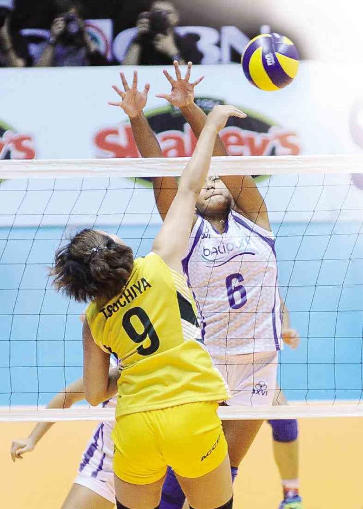 ANGELINE Gervacio of Bali Pure fails to stop Maria Tsuchiya of Baguio in their Shakey’s V-League match yesterday. AUGUST DELA CRUZ