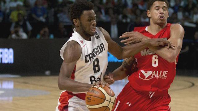 Canada’s Andrew Wiggins, left, controls the ball under pressure from Mexico’s Juan Toscano during a FIBA Americas Championship basketball game in Mexico City on Tuesday. AP
