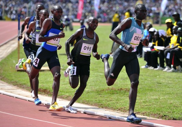 Kenyan athlete David Rudisha (R) sprints to win the men's race 800M race on June 30, 2016, during the Olympic selection trials at the Kipchoge stadium in Eldoret.   / AFP PHOTO / SIMON MAINA
