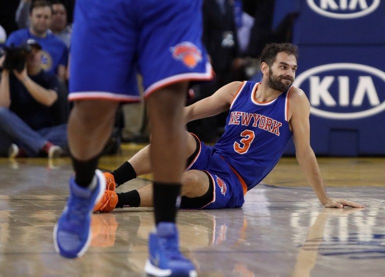 OAKLAND, CA - MARCH 16: Jose Calderon #3 of the New York Knicks sits on the court after hurting himself during their game against the Golden State Warriors at ORACLE Arena on March 16, 2016 in Oakland, California. AFP file photo