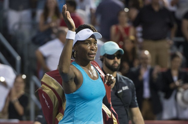Venus Williams, of the United States, salutes the crowd as she walks off the court after a 6-1, 6-7 (2), 6-3 loss to Madison Keys, of the United States, at the Rogers Cup tennis tournament Thursday, July 28, 2016, in Montreal. (Paul Chiasson/The Canadian Press via AP)
