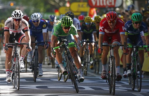 Peter Sagan of Slovakia, wearing the best sprinter's green jersey crosses the finish line ahead of Norways Alexander Kristoff, center right, to win the sixteenth stage of the Tour de France cycling race over 209 kilometers (129.9 miles) with start in Moirans-en-Montagne and finish in Bern, Switzerland, Monday, July 18, 2016. (AP Photo/Peter Dejong)
