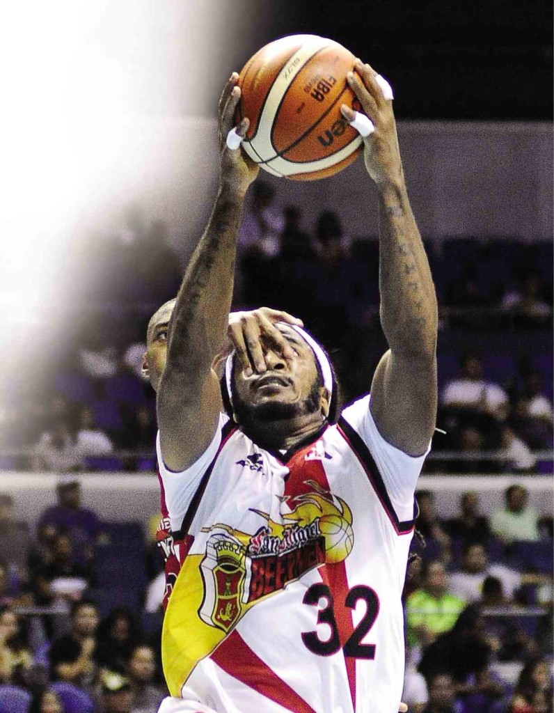 ARIZONA Reid of San Miguel Beer draws a foul from Mahindra import James White (partly hidden). AUGUST DELA CRUZ