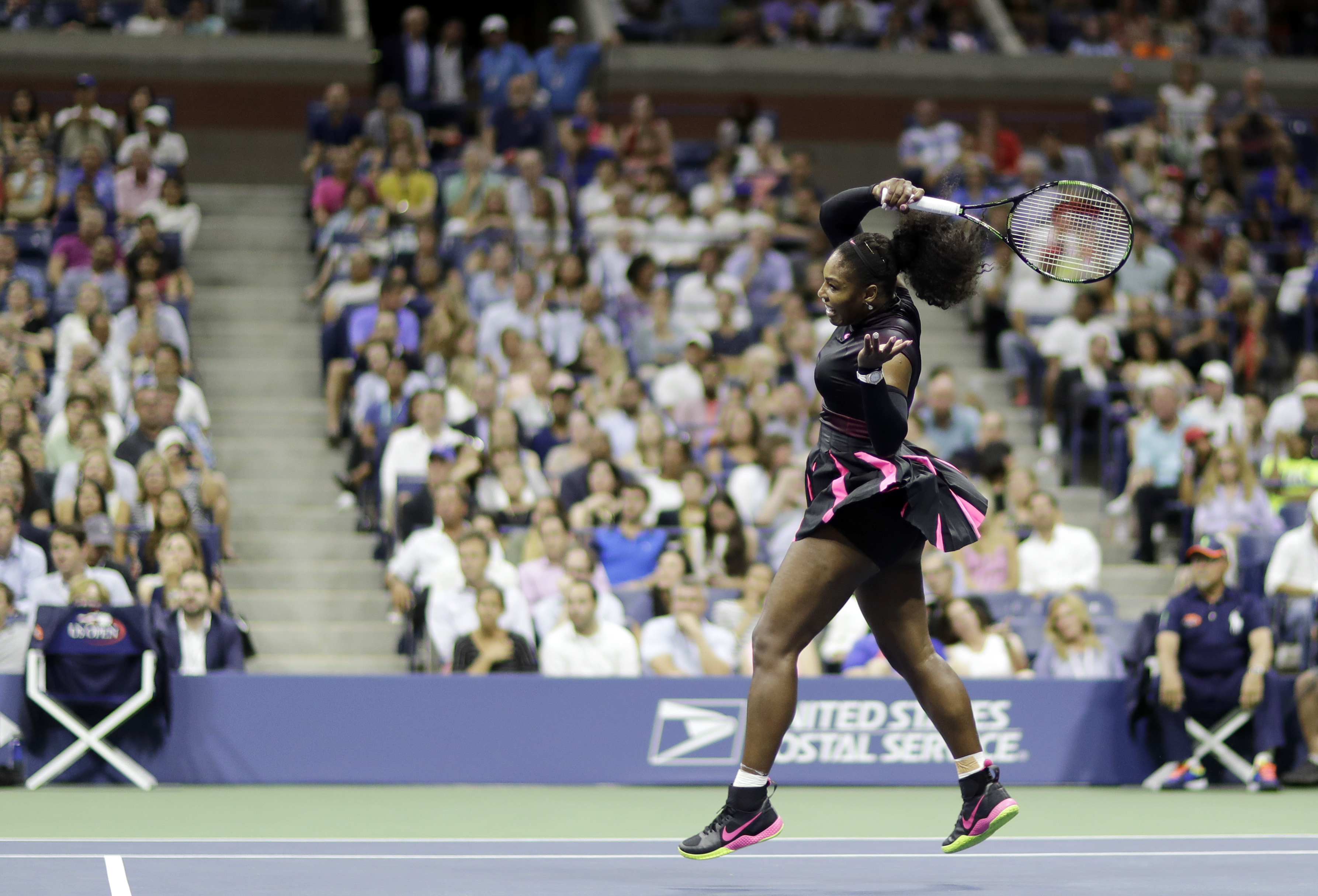 Serena Williams returns a shot to Ekaterina Makarova, of Russia, during the first round of the U.S. Open tennis tournament, Tuesday, Aug. 30, 2016, in New York. (AP Photo/Darron Cummings)