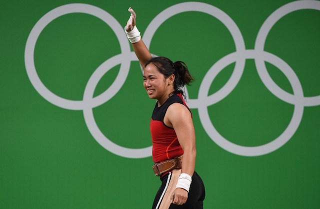 Philippines' Hidilyn Diaz celebrates during the women's 53kg weightlifting event at the Rio 2016 Olympic games in Rio de Janeiro on August 7, 2016. AFP