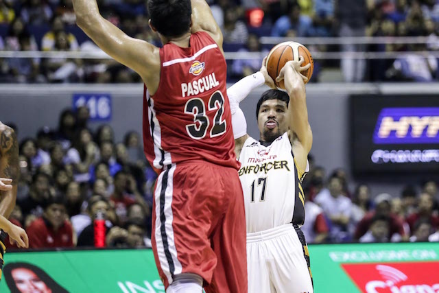 Mahindra playing-coach Manny Pacquiao shoots a 3-pointer over Blackwater big man Kyle Pascual. Tristan Tamayo/INQUIRER.net