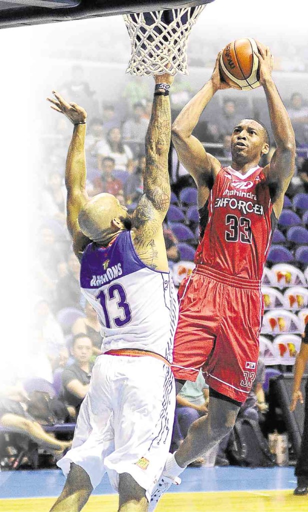 JAMES White (right) helps Mahindra break new ground with a victory over Mychal Ammons and TNT KaTropa. The Enforcers made their first playoff appearance in franchise history.  AUGUST DELA CRUZ