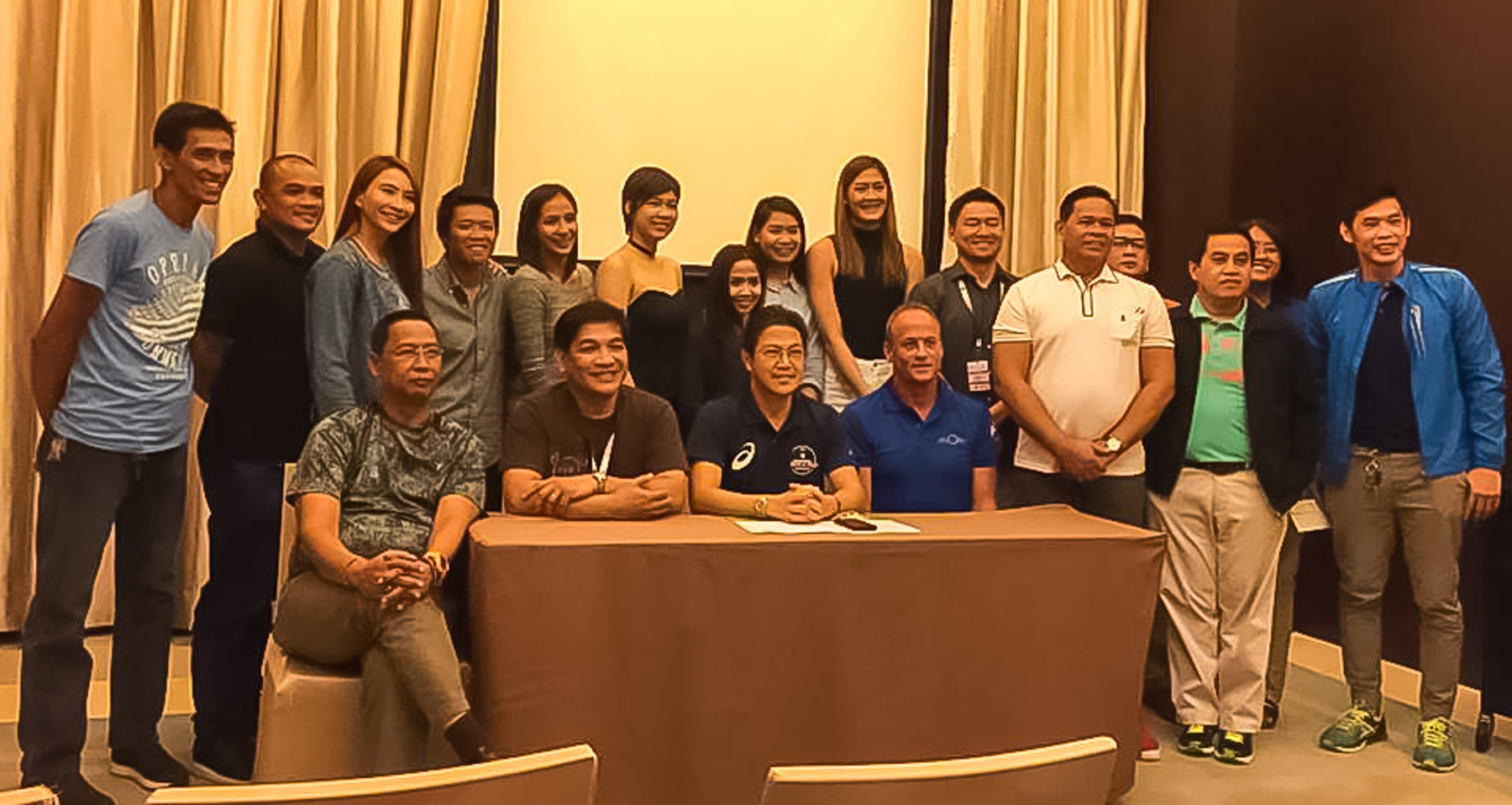 The local players, along with Philippine Superliga (PSL) president Ramon 'Tats' Suzara and Eventcourt CEO Peter Bratschi pose after the appointment of Japanese mentor Shun Takahasi as the team's coach for the FIVB Women's Club World Championship Thursday night at the Crimson Hotel. The FIVB Women's Club World Championship is set Oct. 18-23 at the SM-MOA Arena.  