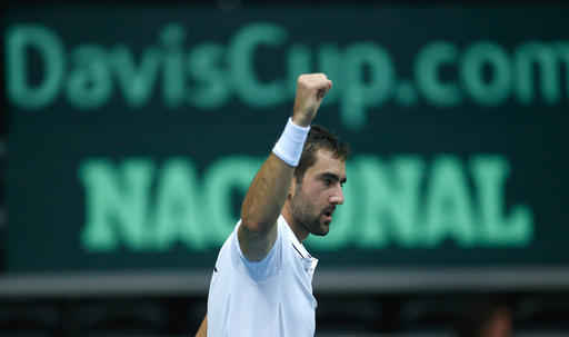 Croatia's Marin Cilic reacts after winning a point against France's Richard Gasquet during day three of the Davis Cup semifinal tennis match between Croatia and France. AP