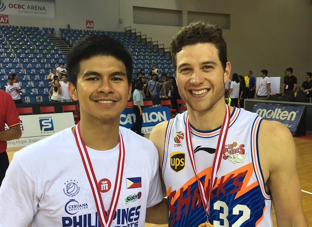 Kiefer Ravena of Mighty Sports Philippines takes a photo with Jimmer Fredette of Shanghai Sharks after their thrilling championship game in the 2016 Merlion Cup. Photo taken from Kiefer Ravena's Twitter account