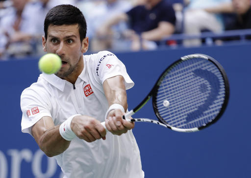 Novak Djokovic, of Serbia, returns a shot to Gael Monfils, of France, during the semifinals of the U.S. Open tennis tournament, Friday, Sept. 9, 2016, in New York. AP Photo