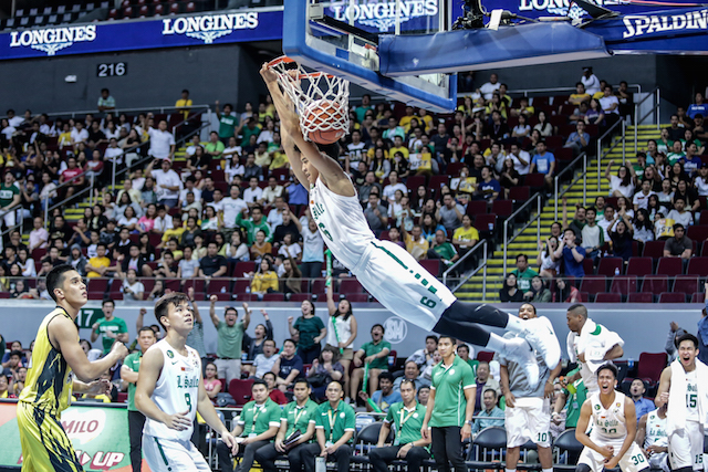 La Salle's Ricci Rivero puts the finishing touches in the Green Archers' 100-62 demolition of the UST Growling Tigers. Tristan Tamayo/INQUIRER.net