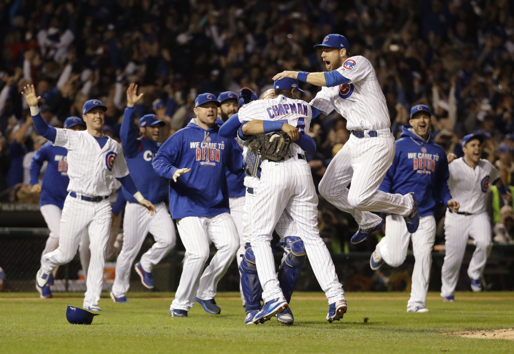 Chicago Cubs players celebrate after Game 6 of the National League baseball championship series against the Los Angeles Dodgers, Saturday, Oct. 22, 2016, in Chicago. The Cubs won 5-0 to win the series and advance to the World Series against the Cleveland Indians. (AP Photo/David J. Phillip)