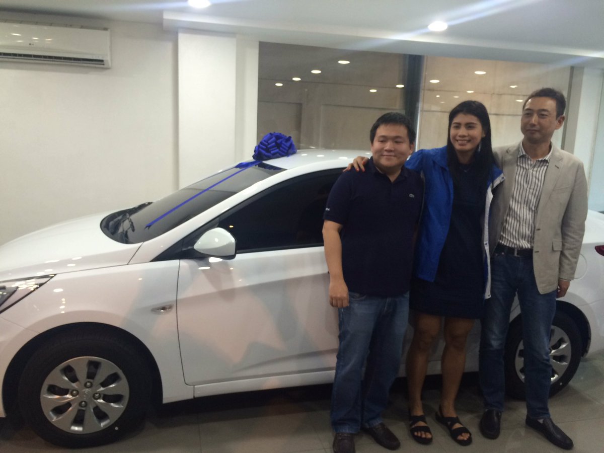 Myla Pablo poses with her brandnew car as part of her signing bonus with Pocari Sweat. Photo by Randolph Leongson