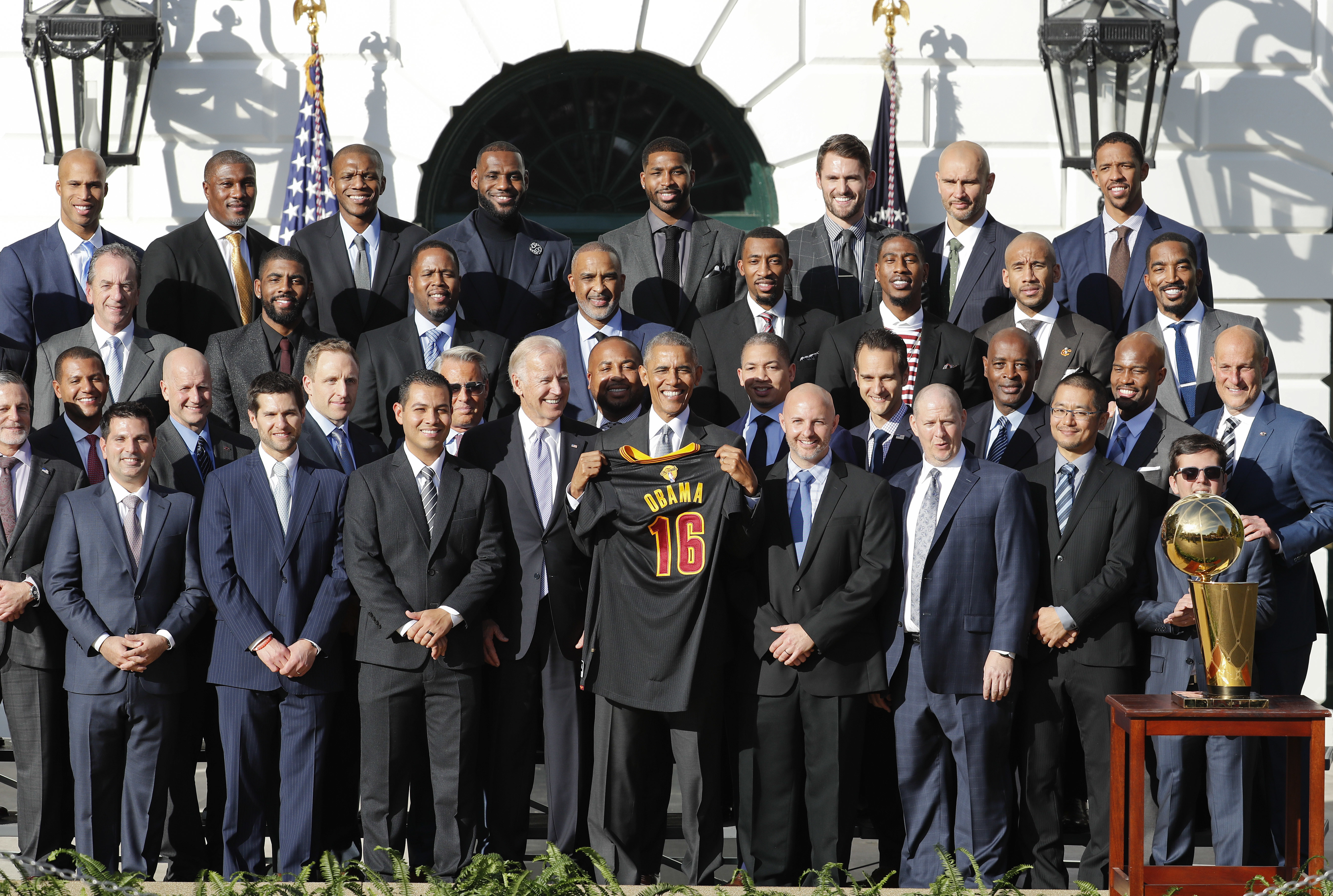 President Barack Obama and Vice President Joe Biden poses for a group photograph with Cleveland Cavaliers team members as the president honored the 2016 NBA Champions Cleveland Cavaliers basketball team during a ceremony on the South Lawn of the White House in Washington, Thursday, Nov. 10, 2016. (AP Photo/Pablo Martinez Monsivais)