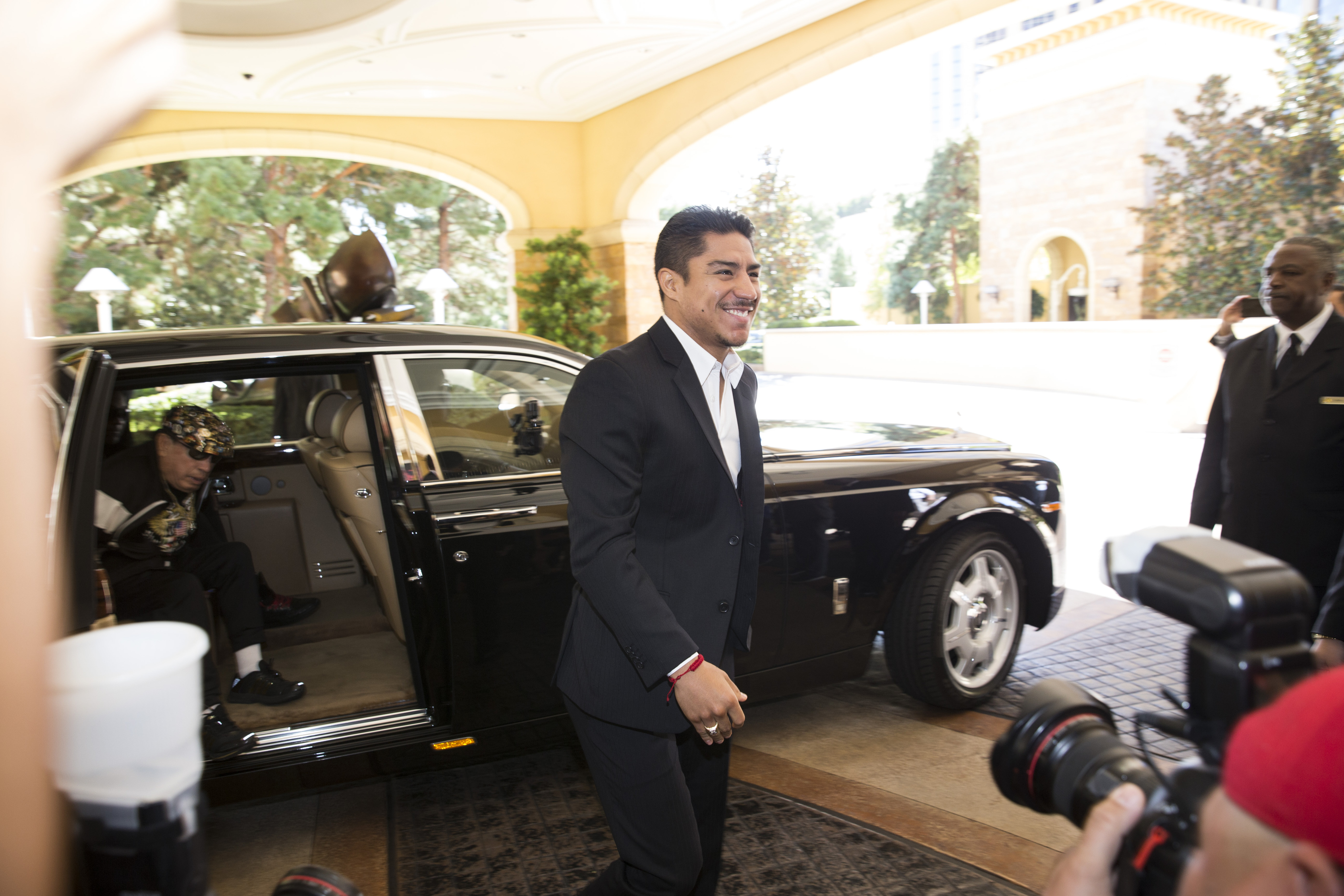 Boxer Jessie Vargas makes his "Grand Arrival" to the Wynn hotel-casino on Tuesday, Nov. 1, 2016, in Las Vegas. Vargas is scheduled to fight Manny Pacquiao  on Saturday night at the Thomas & Mack Center. (Erik Verduzco/Las Vegas Review-Journal via AP)