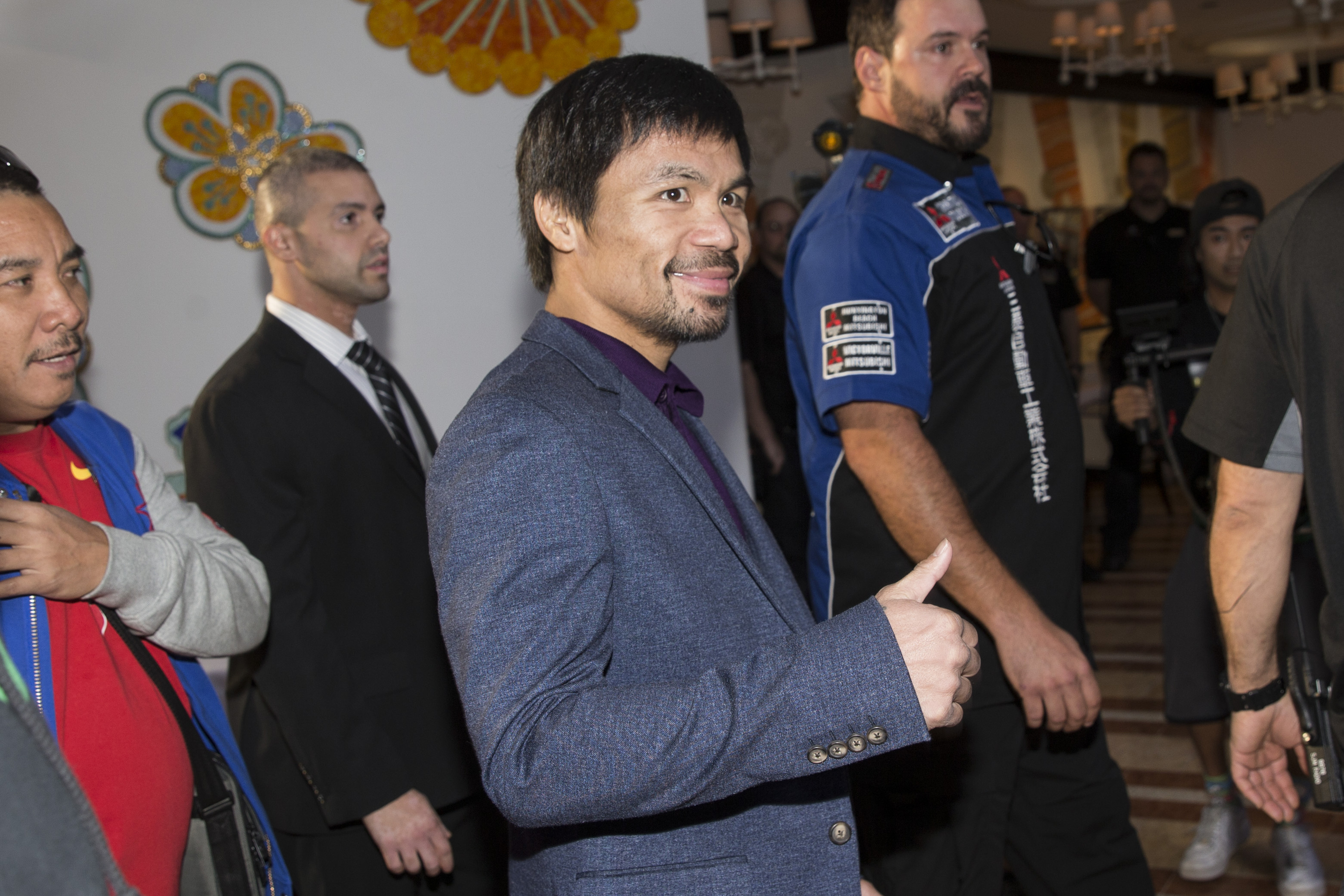 Boxer Manny Pacquiao makes his "Grand Arrival" to the Wynn hotel-casino on Tuesday, Nov. 1, 2016, in Las Vegas. Pacquiao is scheduled to fight Jessie Vargas on Saturday night at the Thomas & Mack Center. (Erik Verduzco/Las Vegas Review-Journal via AP)