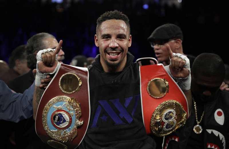 Andre Ward celebrates after defeating Sergey Kovalev, of Russia, during their light heavyweight boxing title bout, Saturday, Nov. 19, 2016, in Las Vegas. AP