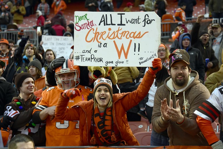CLEVELAND, OH - DECEMBER 24: Cleveland Browns fans celebrates after defeating the San Diego Chargers 20-17 at FirstEnergy Stadium on December 24, 2016 in Cleveland, Ohio.   Jason Miller/Getty Images/AFP