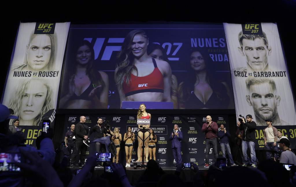 Ronda Rousey poses for photographers during an event for UFC 207, Thursday, Dec. 29, 2016, in Las Vegas. Rousey is scheduled to fight Amanda Nunes in a mixed martial arts women's bantamweight championship bout Saturday in Las Vegas. (AP Photo/John Locher)