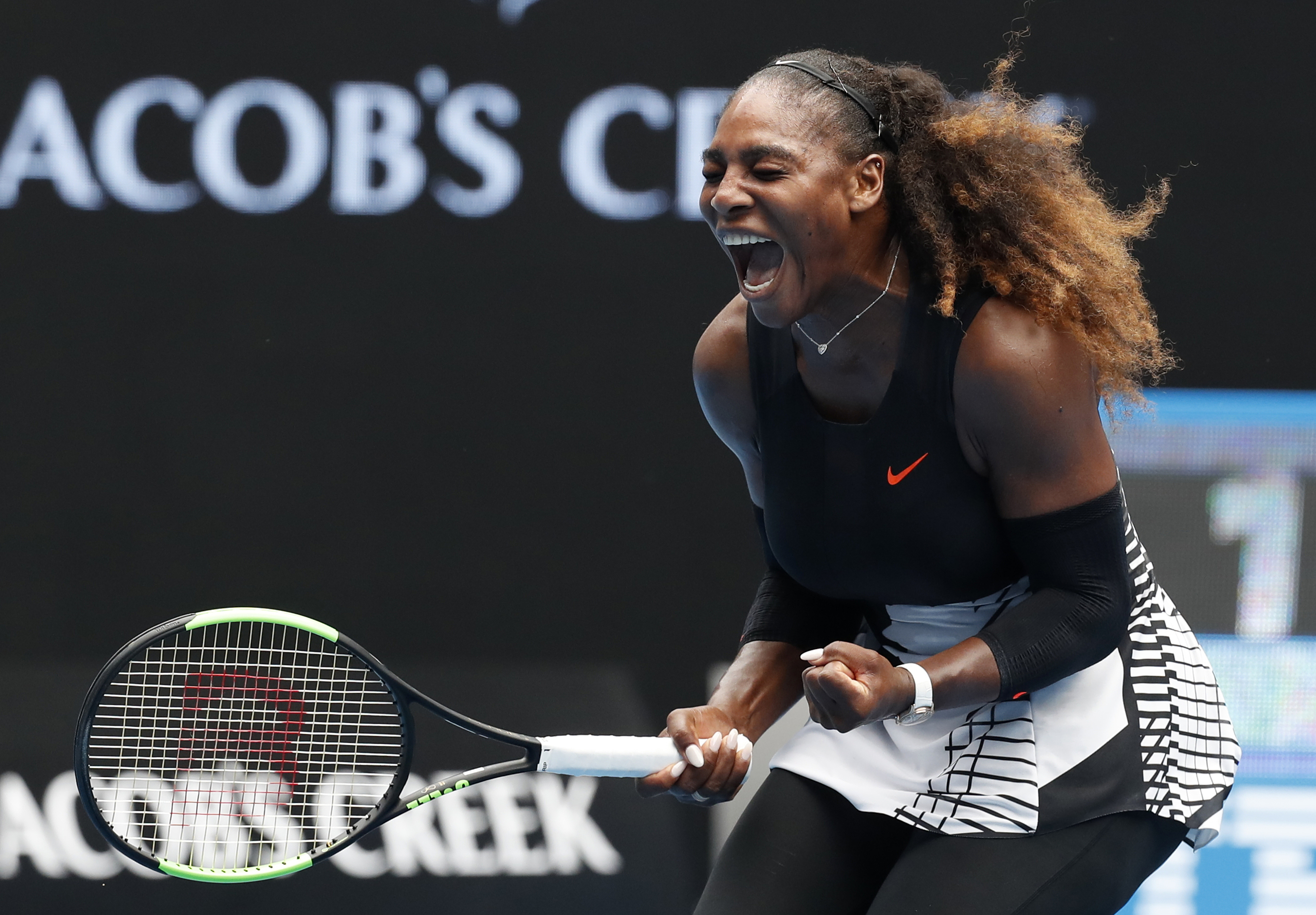 United States' Serena Williams celebrates after winning the first set against Barbora Strycova of the Czech Republic during their fourth round match at the Australian Open tennis championships in Melbourne, Australia, Monday, Jan. 23, 2017. (AP Photo/Kin Cheung)