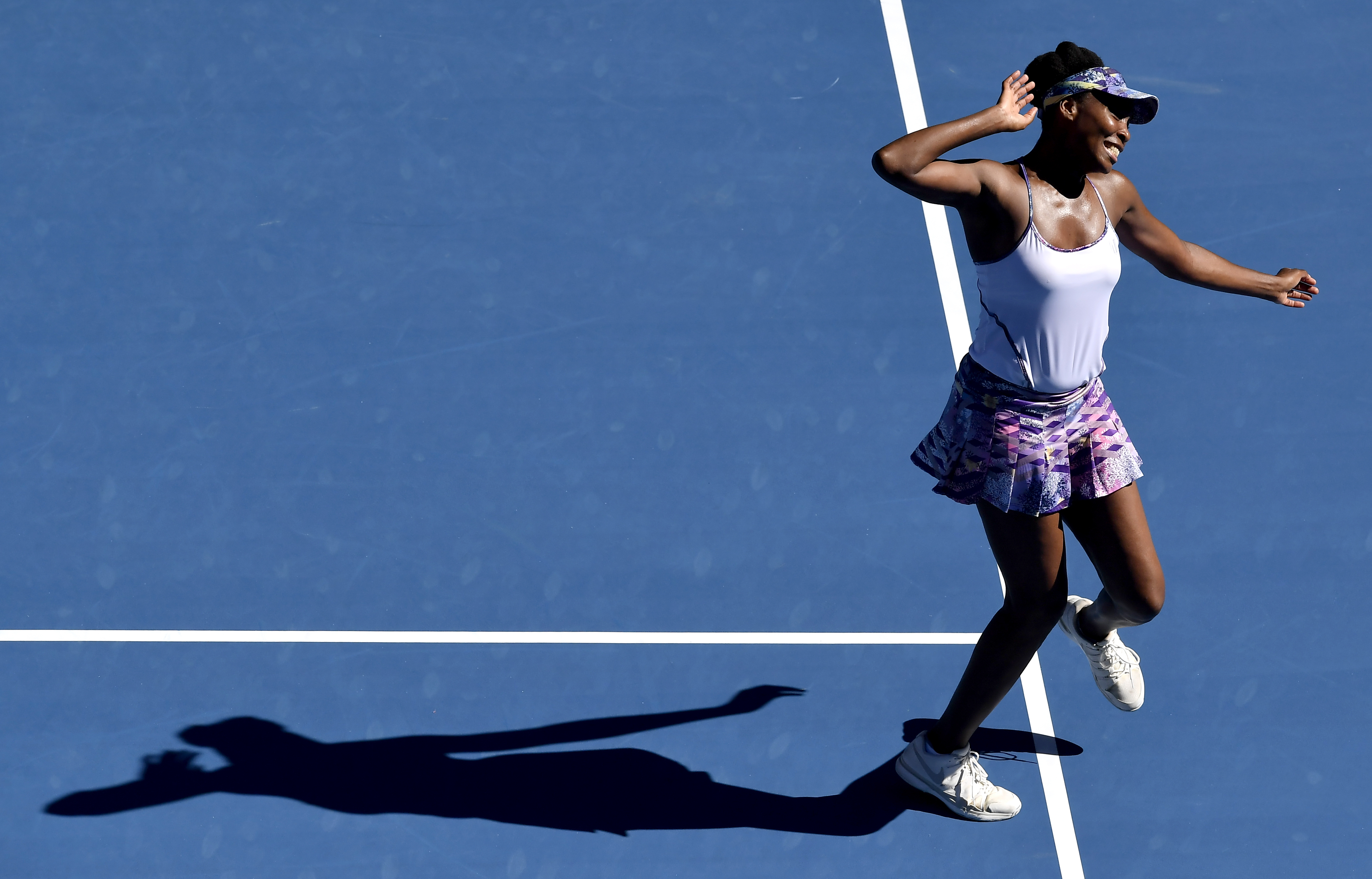 United States' Venus Williams celebrates after defeating compatriot Coco Vandeweghe during their semifinal at the Australian Open tennis championships in Melbourne, Australia, Thursday, Jan. 26, 2017. (AP Photo/Andy Brownbill)