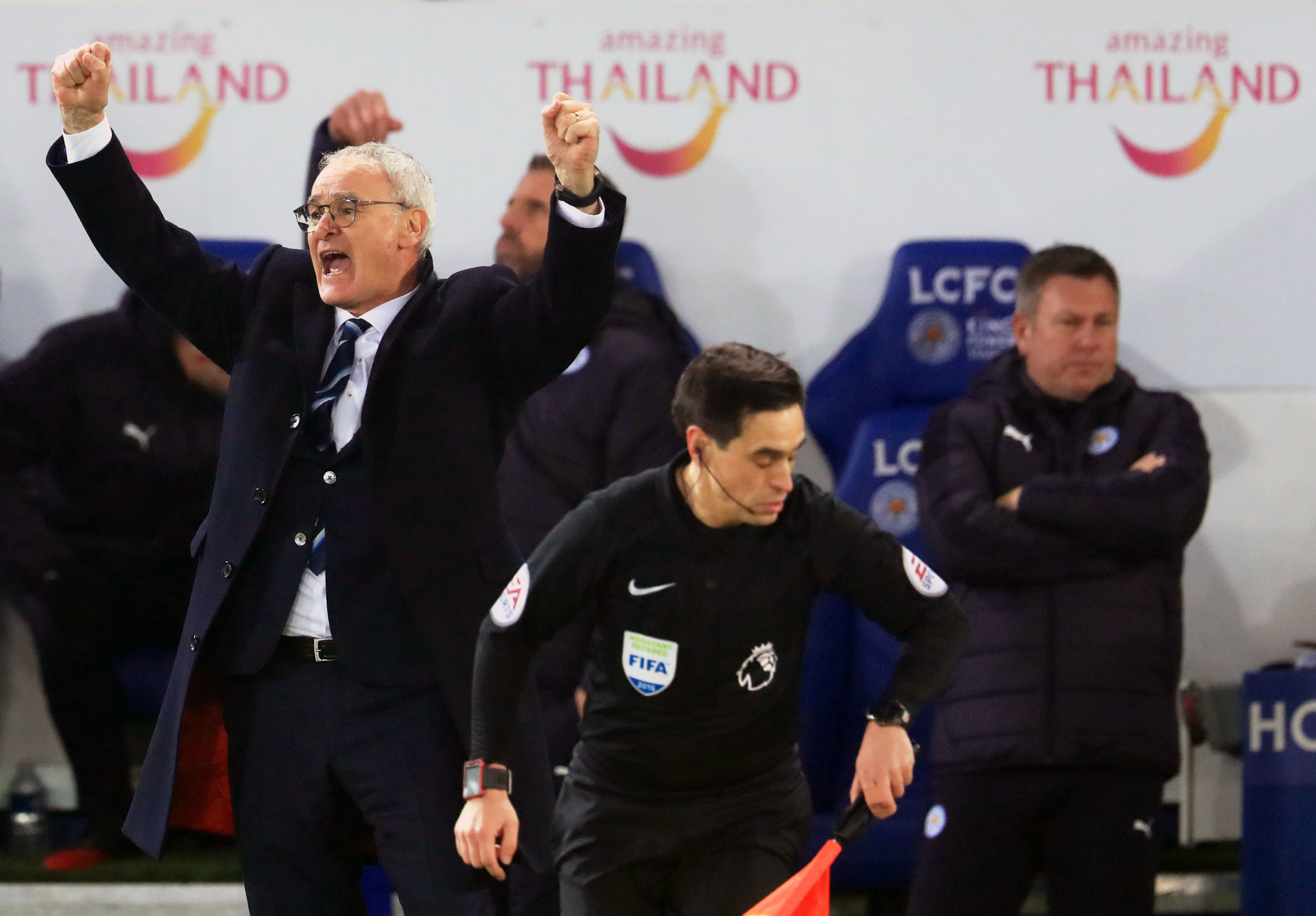 Leicester City manager, Claudio Ranieri, left, celebrates victory at the final whistle of the English Premier League soccer match Leicester City versus West Ham United at the King Power Stadium, Leicester, England, Saturday, Dec. 31, 2016. AP