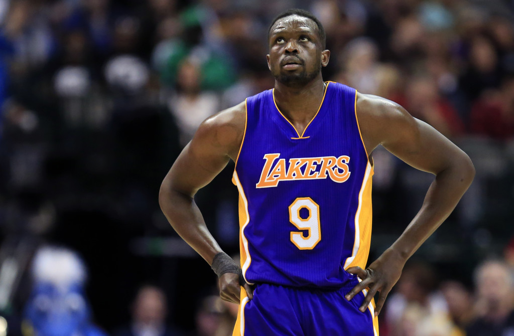 Los Angeles Lakers forward Luol Deng (9) walks toward the bench during the second half of an NBA basketball game against the Dallas Mavericks, Sunday, Jan. 22, 2017, in Dallas. (AP Photo/Ron Jenkins)