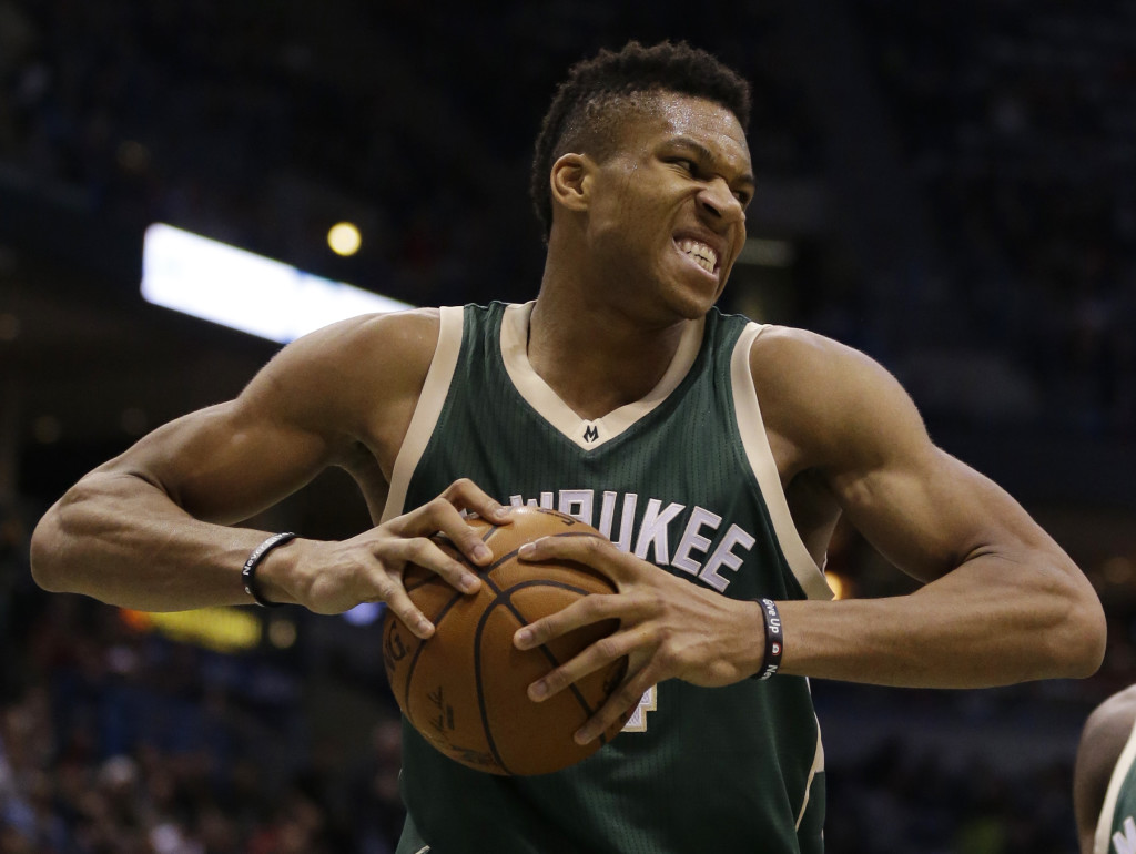 Milwaukee Bucks' Giannis Antetokounmpo reacts in a play against the Oklahoma City Thunder during the second half of an NBA basketball game Monday, Jan. 2, 2017, in Milwaukee. (AP Photo/Jeffrey Phelps)