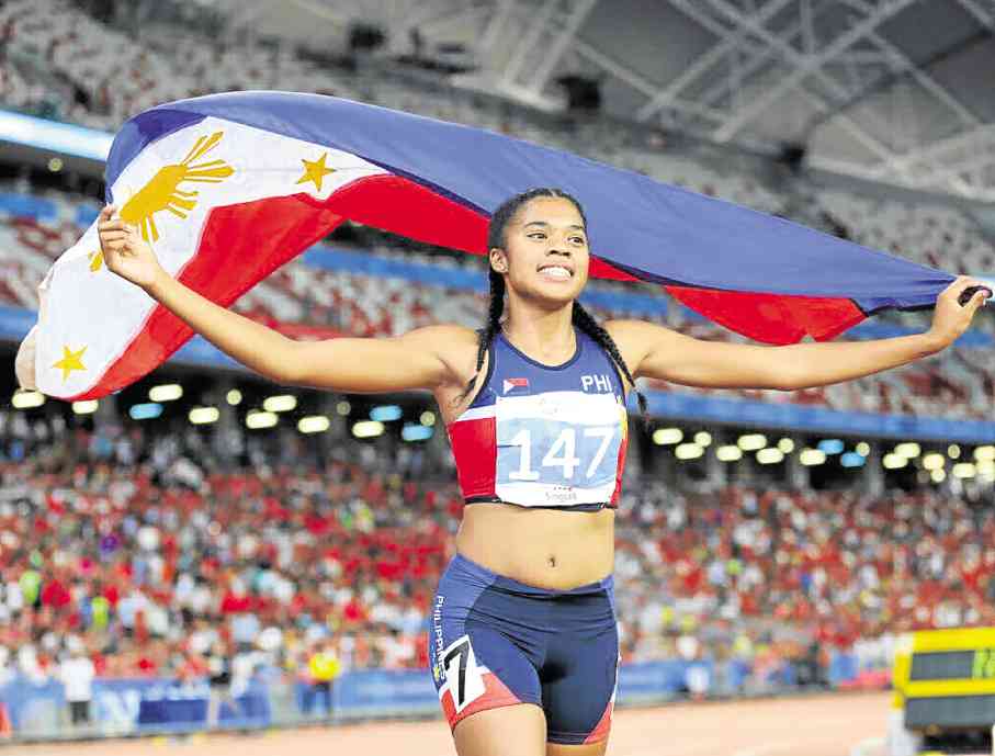 FILE - Kyla Richardson’s splendid 100m victory in Singapore capped the country’s huge century-dash double in the SEA Games.
