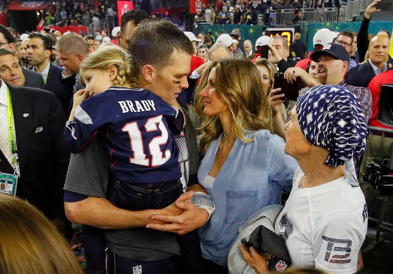 Tom Brady #12 of the New England Patriots celebrates with wife Gisele Bundchen and daughter Vivian Brady after defeating the Atlanta Falcons during Super Bowl 51 at NRG Stadium on February 5, 2017 in Houston, Texas.