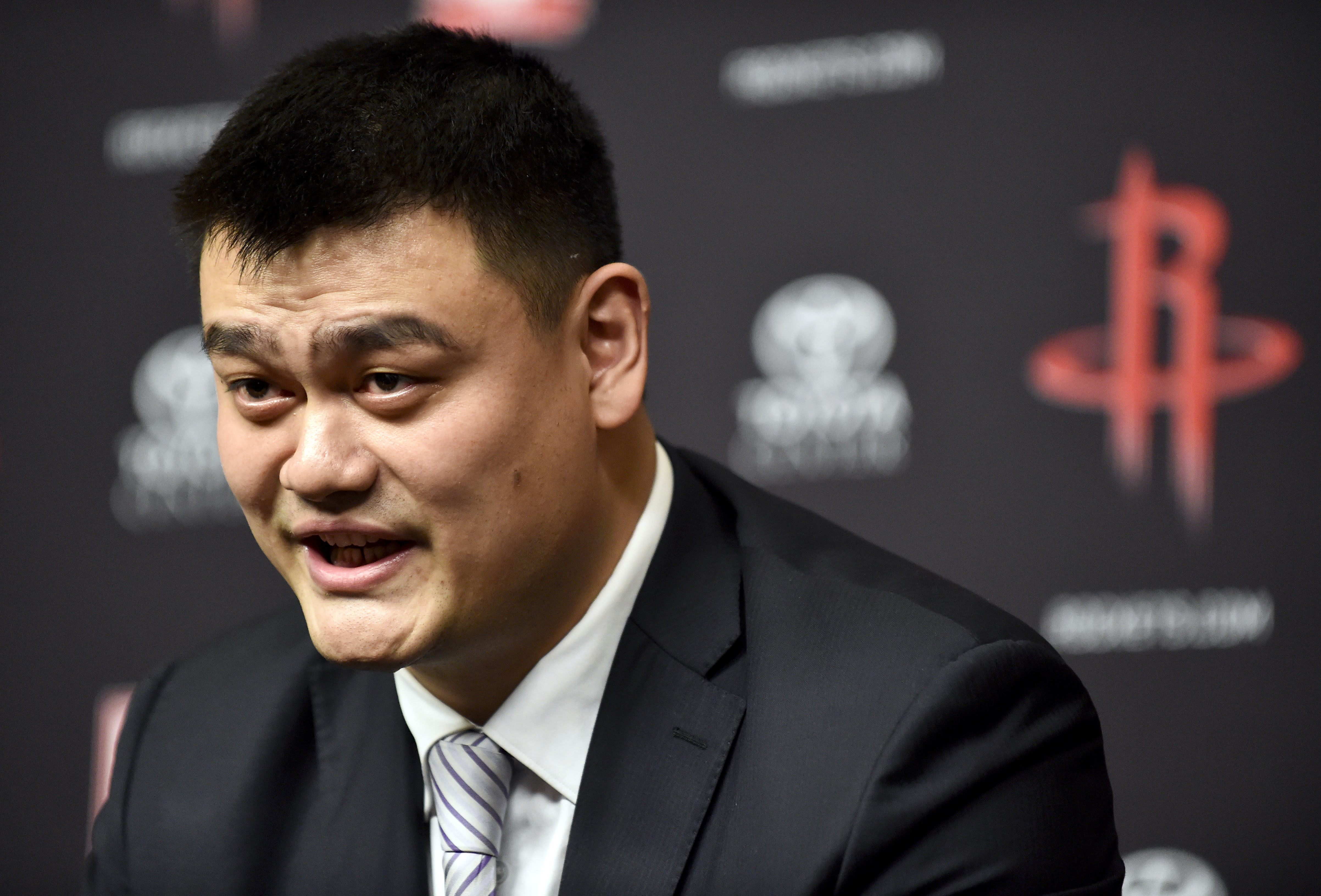 Retired Houston Rockets center Yao Ming speaks to the media before an NBA basketball game between the Houston Rockets and Chicago Bulls, Friday, Feb. 3, 2017, in Houston. (AP Photo/Eric Christian Smith)
