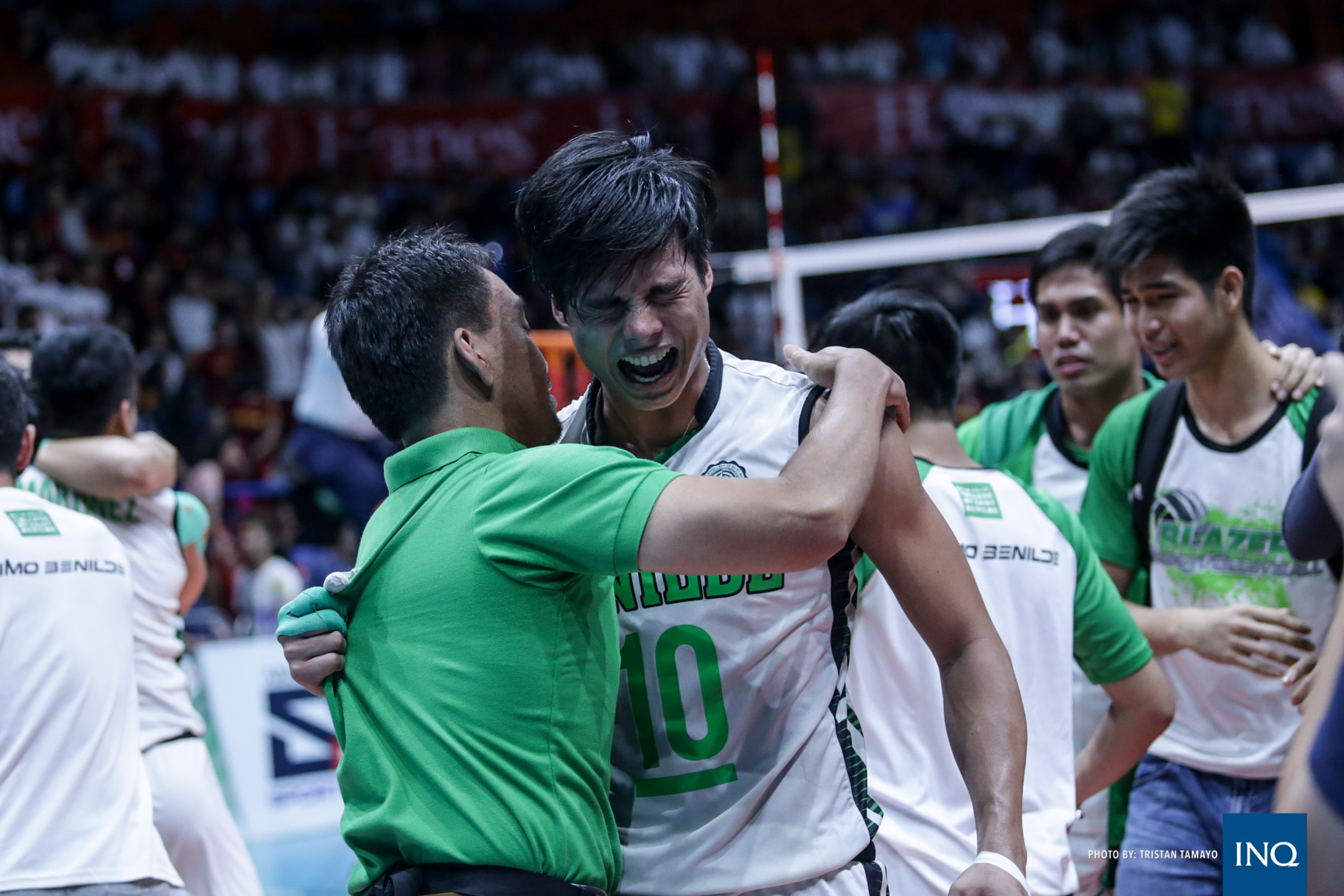 An emotional Johnvic Guzman after the St. Benilde Blazers clinch the title. Photo by Tristan Tamayo/INQUIRER.net