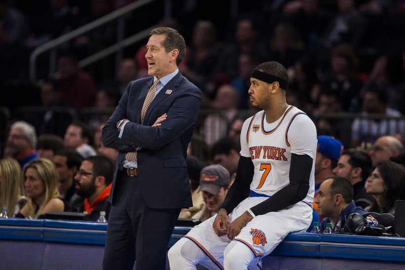 New York Knicks coach Jeff Hornacek, left, talks to Carmelo Anthony during the second half of the team's NBA basketball game against the Cleveland Cavaliers on Saturday, Feb. 4, 2017, in New York. (AP Photo/Andres Kudacki)