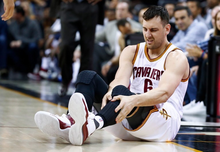 Andrew Bogut #6 of the Cleveland Cavaliers reacts after getting hurt in the first half while playing the Miami Heat at Quicken Loans Arena on March 6, 2017 in Cleveland, Ohio. NOTE TO USER: User expressly acknowledges and agrees that, by downloading and or using this photograph, User is consenting to the terms and conditions of the Getty Images License Agreement.   Gregory Shamus/Getty Images/AFP
