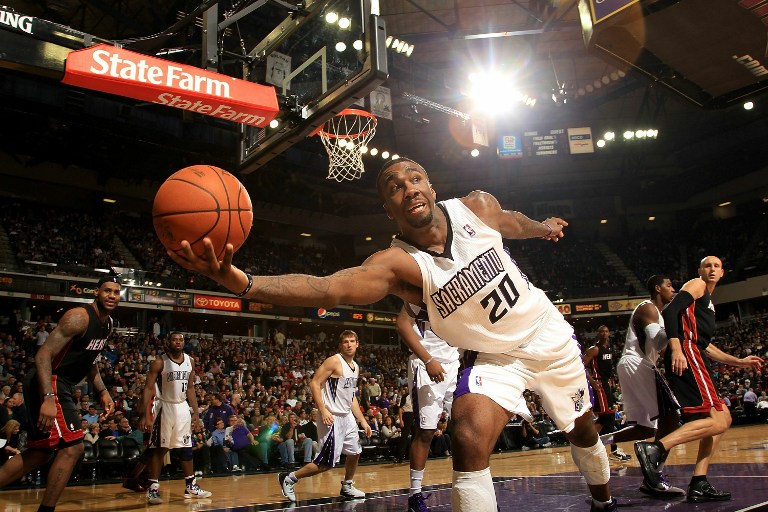 Donte Greene #20 the Sacramento Kings saves the ball from going out of bounds during their game against the Miami Heat at ARCO Arena on December 11, 2010 in Sacramento, California. NOTE TO USER: User expressly acknowledges and agrees that, by downloading and or using this photograph, User is consenting to the terms and conditions of the Getty Images License Agreement.   Ezra Shaw/Getty Images/AFP